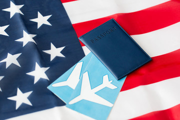 american flag, passport and air tickets