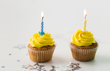 birthday cupcakes with burning candles