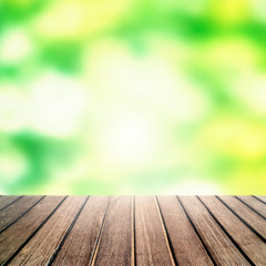 Naklejka na ściany i meble Spring Background. Wood panel tabletop with Abstract Spring blur