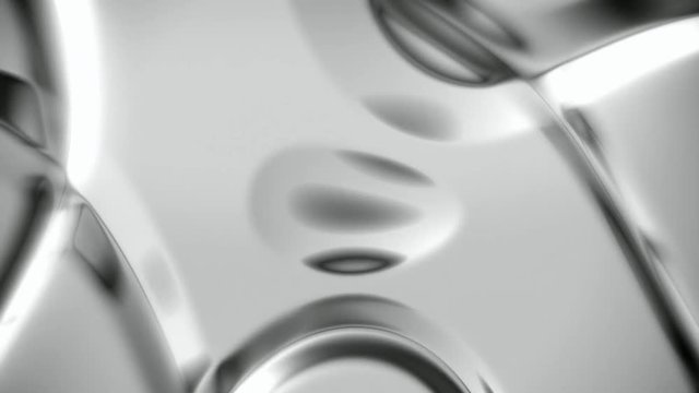 Silver metallic abstract background with soft folds seamless loop