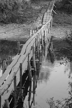 Fototapeta  Old wooden bridge in black and white 