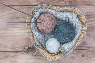 Ball of wool on a rustic table