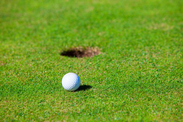 Golf ball and the hole