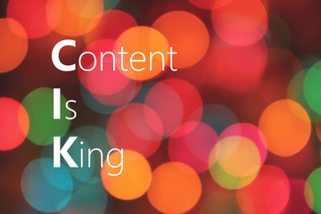 Content Is King text on colorful bokeh background