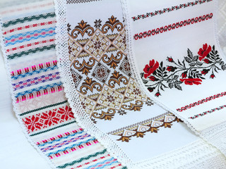Old traditional balkan handmade floral embroidery on white canva