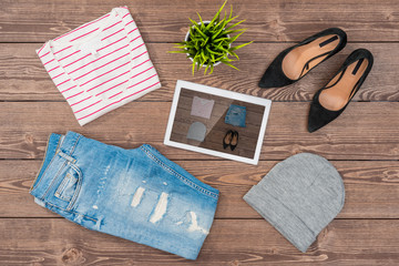 Online shopping concept with casual female clothes