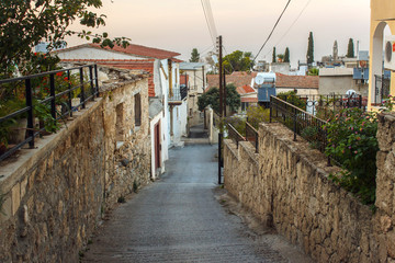 Fototapeta na wymiar The famous Bitter Lemons street, where lived and worked classic of English literature Lawrence Durrell in Bellapais village near the town of Kyrenia (Girne), Northern Cyprus.