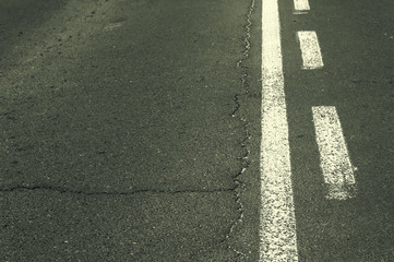 Double white line on asphalt road.