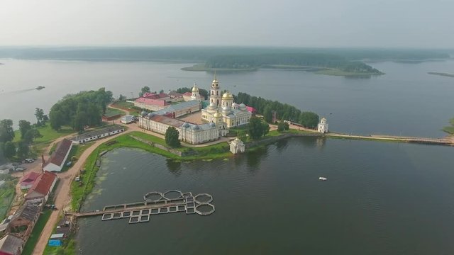 Aerial view on Nilo-Stolobensky (Nil) deserts - Orthodox monastery and the lake Seliger, Tver region, Russia, 4k
