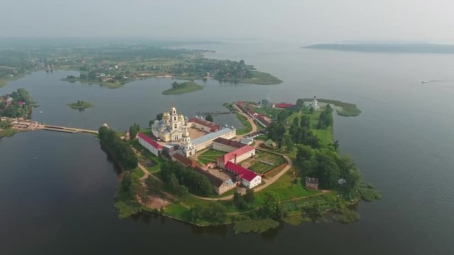 Aerial view on Nilo-Stolobensky (Nil) deserts - Orthodox monastery and the lake Seliger, Tver region, Russia, 4k
