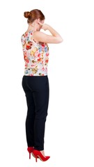 Woman plugs ears with his fingers, not wanting to listen to.  girl  watching. Rear view people collection.  backside view of person.  Isolated over white background.  Girl in office attire stands back
