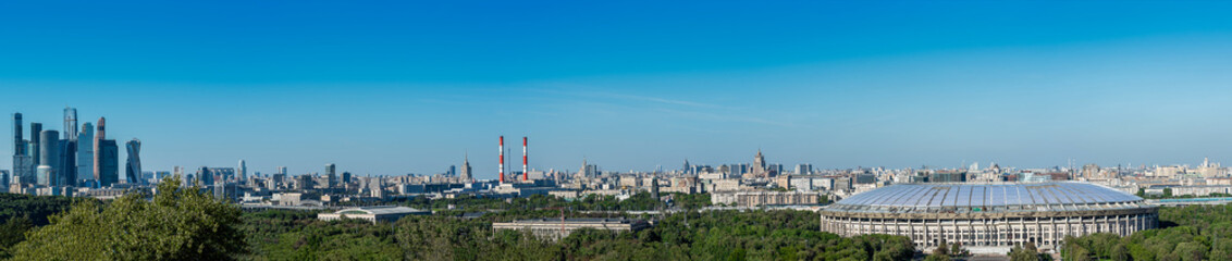 Fototapeta na wymiar Panoramic viewpoint at Sparrow Hills giving excellent panoramic view of the city including new buildings and Luzhniki Stadium in Moscow , Russia