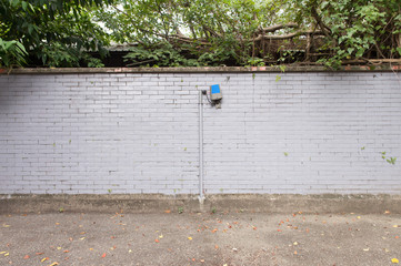 Large blank billboard on a street wall, banners with room to add your own text