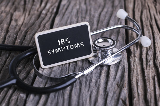 Medicine Concept. Blackboard With Word IBS SYMPTOMS 