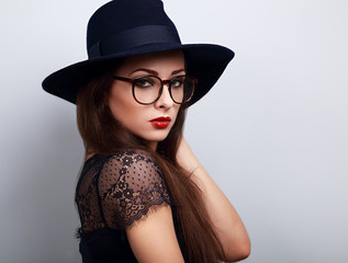 Glamour sexy makeup womna in fashion glasses and dark blue hat l