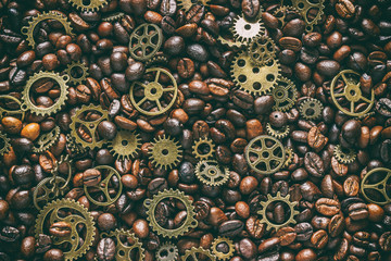 mock up for background in steampunk style. Roasted coffee beans mixed with brass gears. Grunge style toned. Top view.