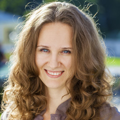 Fototapeta premium Portrait of beautiful young happy woman