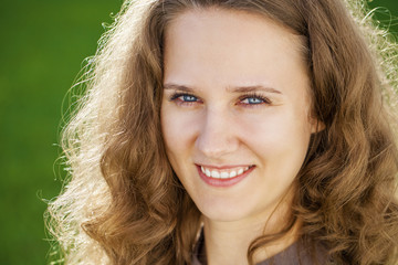Fototapeta premium Portrait of beautiful young happy woman