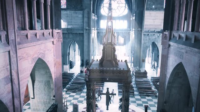 Nave of the cathedral of Manizales  from the balcony when the light enters from the stained glass. 4k