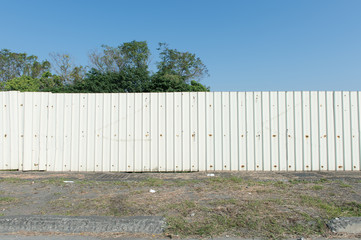 Large blank billboard on a street wall, banners with room to add your own text