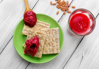 cornel jam on gallet and glass of mors Juice . seeds.top view © vania_zhukevych