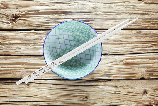 Asian Cuisine - Empty Bowl with Chopsticks