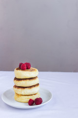 Cottage cheese pancakes, homemade traditional Ukrainian and Russian syrniki.