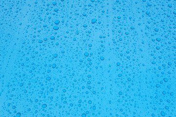 Fototapeta na wymiar drops of water-repellent surface in Blue & white