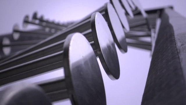 Demonstration of a Wave machine made of steel,  simple device used to show what transverse waves