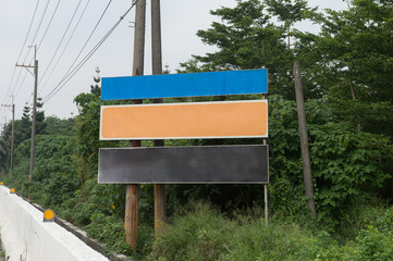 Large blank billboard on a street wall, banners with room to add your own text