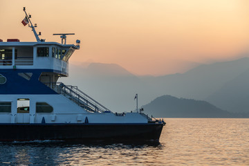 Ferry leaving small town Bellagio at Lake Como, Italy