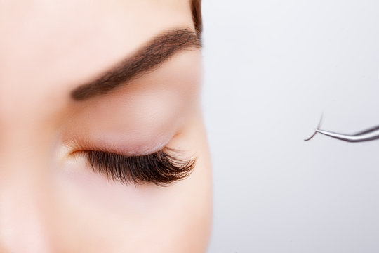 Woman Eye with Long Eyelashes. Eyelash Extension. Lashes, close up, selected focus.