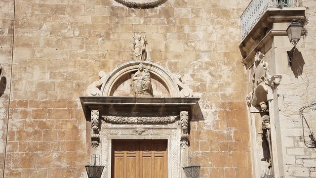 The door of the church of Santa Maria di Costantinopoli (Giovinazzo, Italy). Italian romanic style.