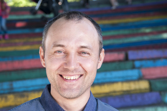 Portrait Of A Smiling Middle-aged Men 