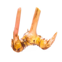 Fresh ginger over white background