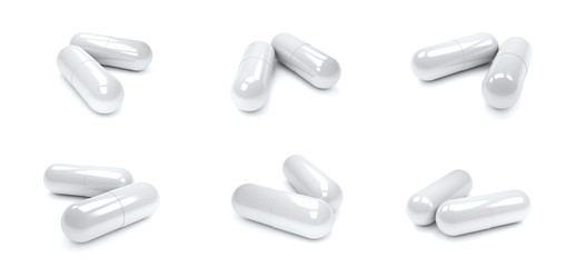 white pills capsules isolated on white background.