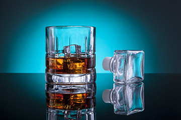 Stopper by glass of liquor.