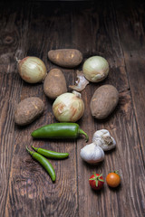 An assortment of vegetables commonly used in cooking.