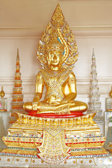 Golden Buddha statue in the King form