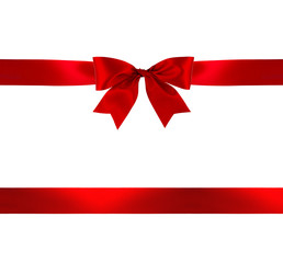 Red gift bow and ribbon on white background with clipping path.