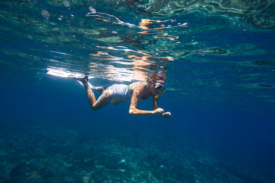 Young women is snorkeling © trubavink
