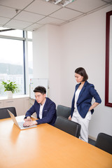 young boss and assistant at work