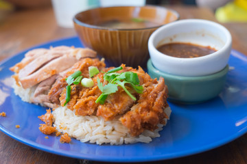 Close up of Fried chicken and boil chicken with rice