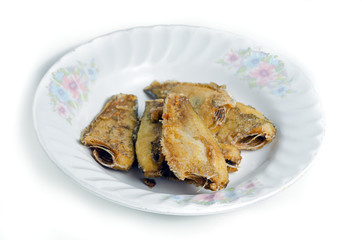 Fried fish (Trichogaster pectoralis) on the dish