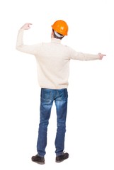Back view of  pointing young men in helmet. Young guy  gesture. Rear view people collection.  backside view of person.  Isolated over white background. Foreman hands gives commands directions.
