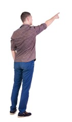 Back view of  pointing young men in  shirt and jeans. Young guy  gesture. Rear view people collection.  backside view of person.  Isolated over white background.
