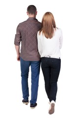  Back view going couple. walking friendly girl and guy holding hands. Rear view people collection. backside view of person. Isolated over white background. 