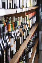 Wine Bottles Displayed On Shelves