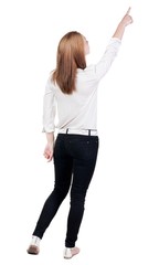 Back view of  pointing woman. beautiful blonde girl. Rear view people collection.  backside view of person.  Isolated over white background.