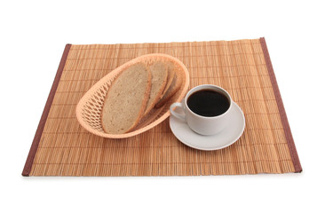Coffee white cup  and basket on wooden table